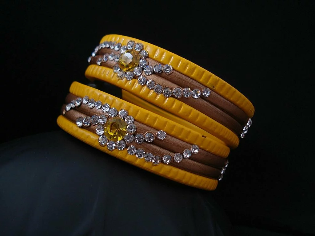 Beautiful wedding bangles, bridal wear photo gallery Beautiful yellow lakh wedding bangles suhag chuda Beautiful wedding bangles, bridal wear photo gallery