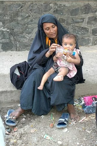 A Muslim Woman Begs A Muslim Woman Begs A Muslim Woman Begs